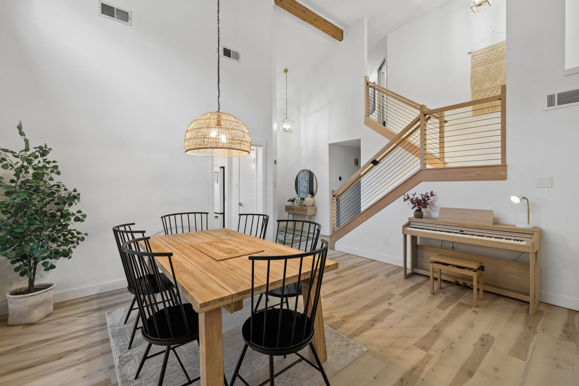 Second Story 7 Charms open-concept designer living room with luxury furnishings